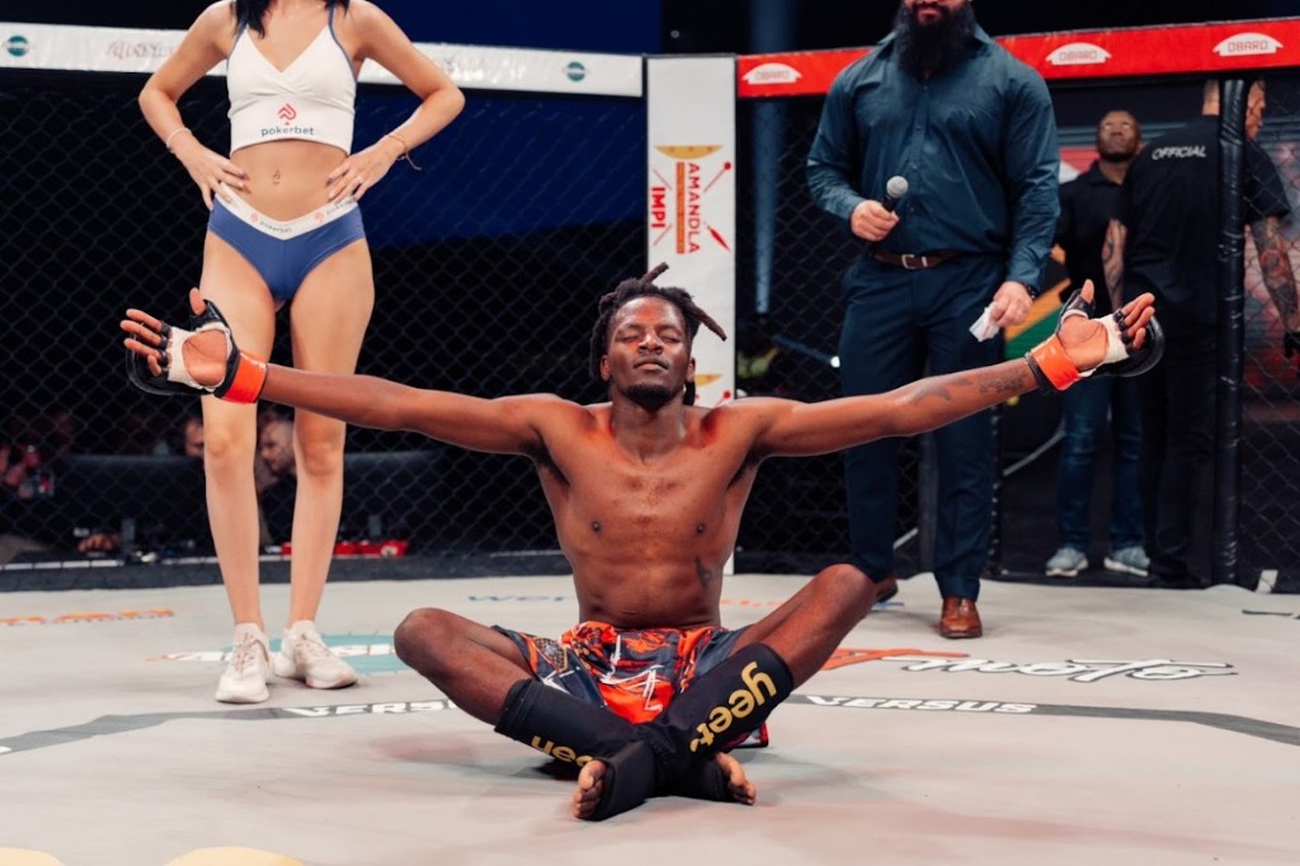 Fighter in the cage — open the In the Cage photo album